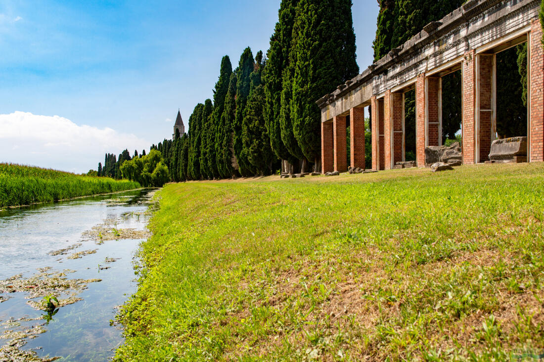 Ruins of the river port of Aquileia - promenade, view of the river