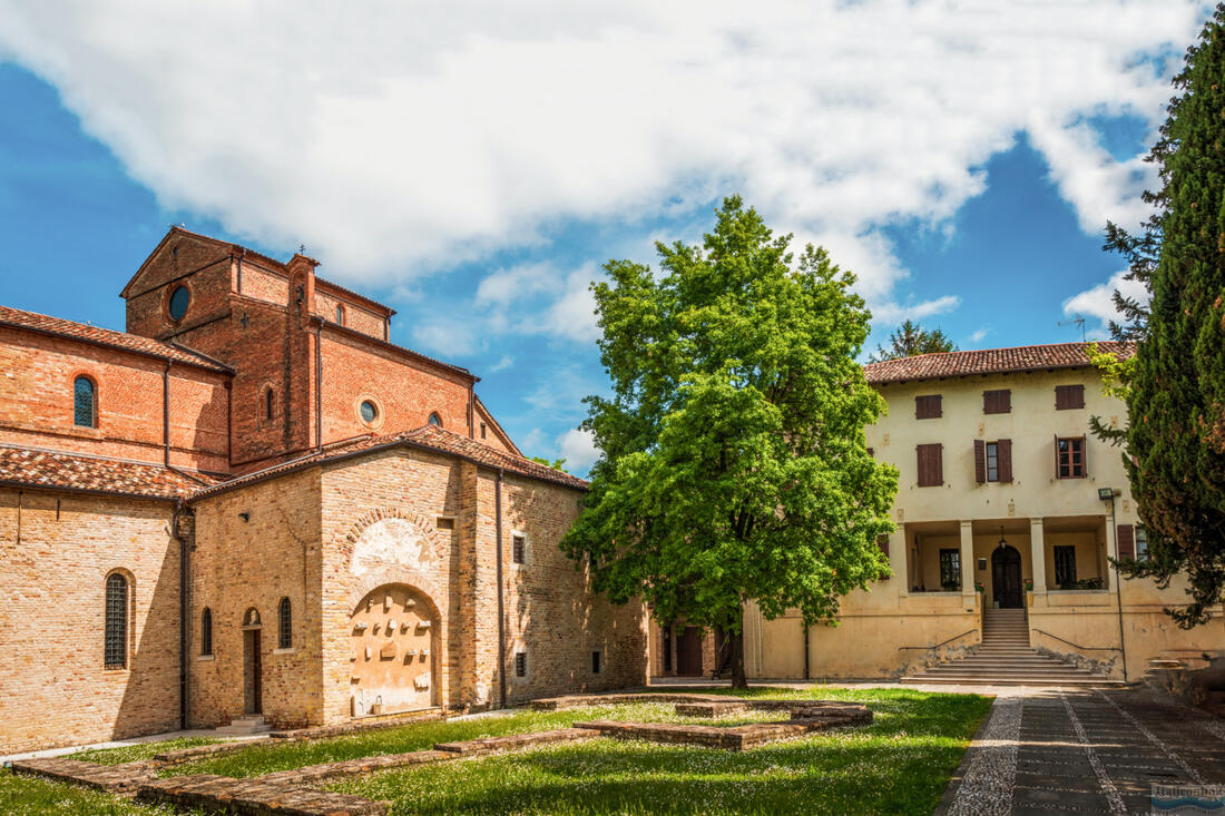 The courtyard of the Abbey of Santa Maria in Silvis in Sesto al Reghena with the foundations of the original ancient triple-apsed church