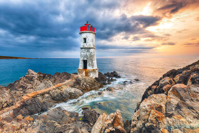 Faro di Capo Ferro: Guardian of the Emerald Coast